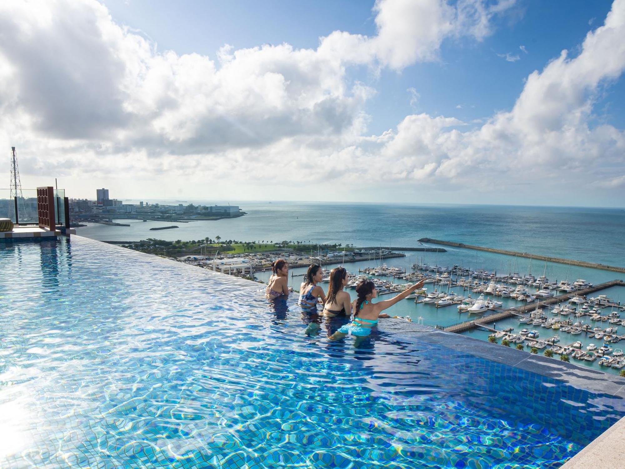 Okinawa Prince Hotel Ocean View Ginowan Exterior photo Infinity pool at the top of the hotel